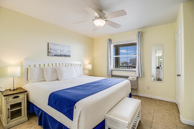 bedroom with light tile patterned floors, baseboards, and ceiling fan