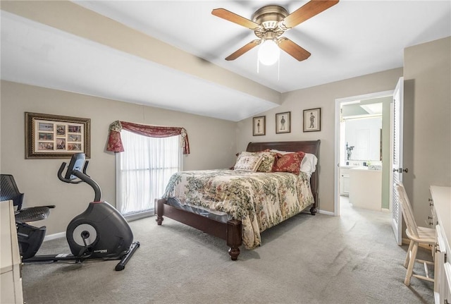 carpeted bedroom featuring lofted ceiling, ceiling fan, and baseboards