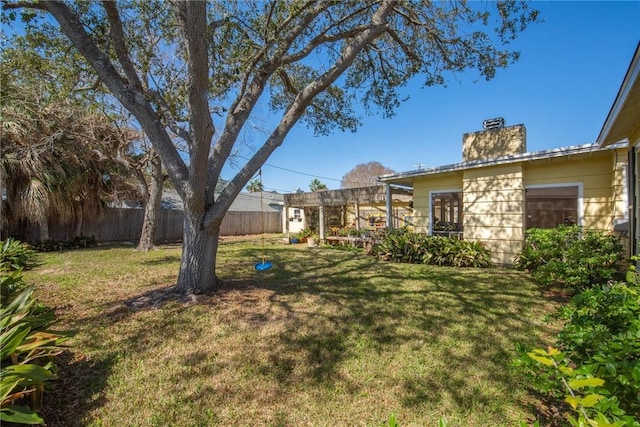 view of yard featuring fence