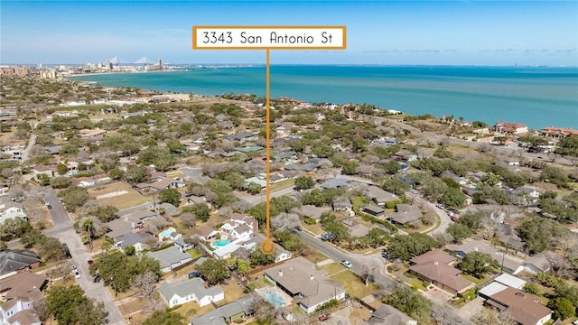 bird's eye view featuring a residential view and a water view