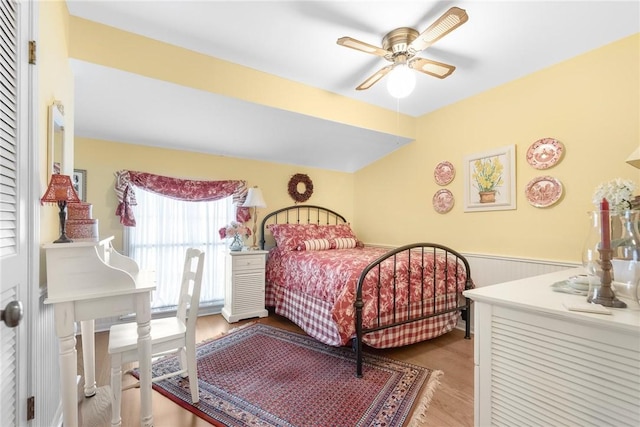 bedroom featuring ceiling fan and wood finished floors