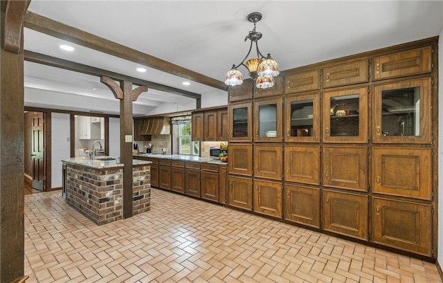 5222 Wooldridge, Corpus Christi, TX 78413 - kitchen featuring recessed lighting, brick patterned flooring, decorative light fixtures, beamed ceiling, and glass insert cabinets