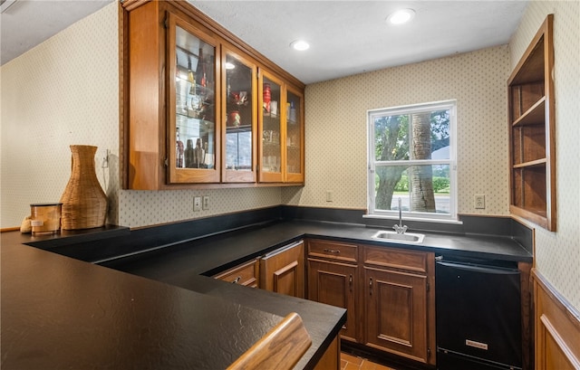 5222 Wooldridge, Corpus Christi, TX 78413 - kitchen featuring dishwasher, wallpapered walls, dark countertops, recessed lighting, and glass insert cabinets