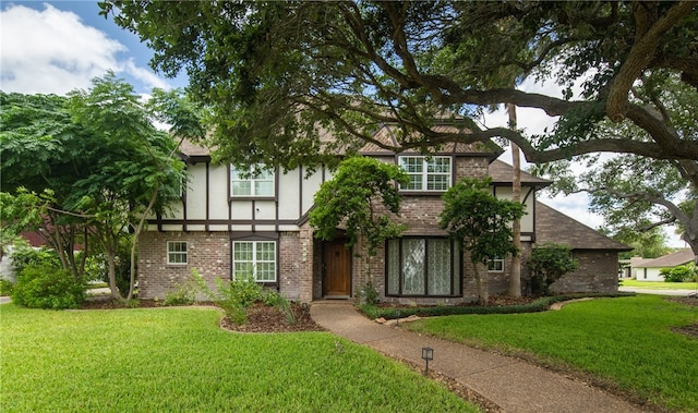 5222 Wooldridge, Corpus Christi, TX 78413 - english style home featuring stucco siding, brick siding, and a front lawn