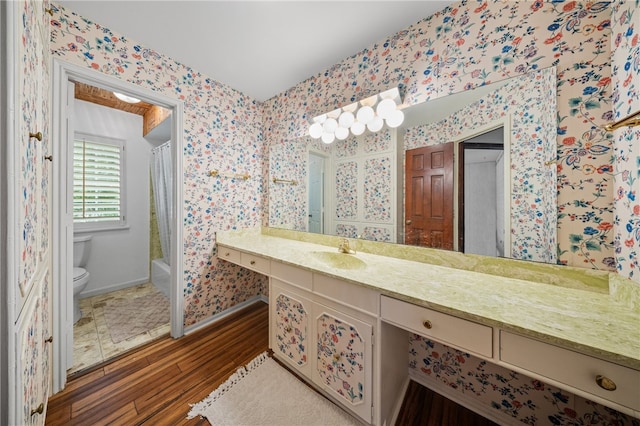 5222 Wooldridge, Corpus Christi, TX 78413 - full bathroom with wood finished floors, vanity, shower / bathtub combination with curtain, and wallpapered walls