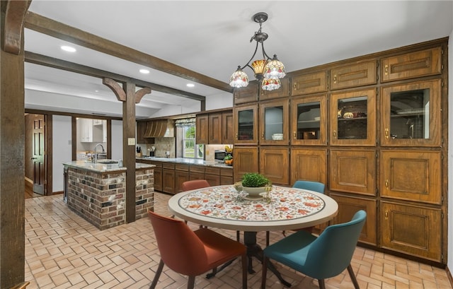 5222 Wooldridge, Corpus Christi, TX 78413 - dining room with brick patterned flooring, recessed lighting, and beamed ceiling