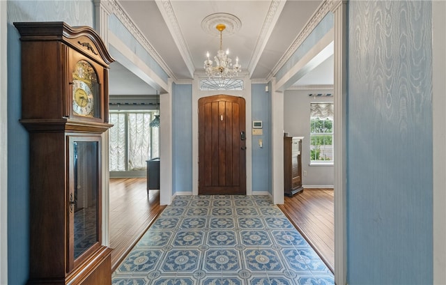 5222 Wooldridge, Corpus Christi, TX 78413 - entryway featuring a chandelier, wood finished floors, and ornamental molding