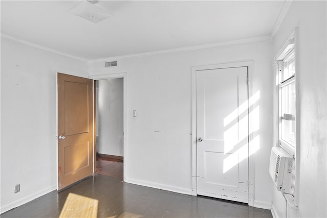 entryway with dark wood-type flooring and crown molding