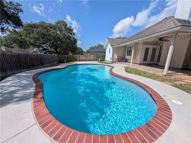 4010 Moorhead Dr, Corpus Christi, TX 78410 - view of swimming pool featuring french doors, a fenced backyard, and a patio area