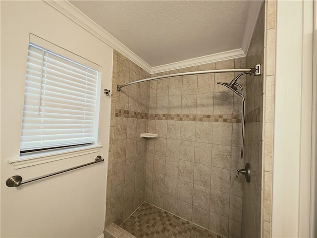 4010 Moorhead Dr, Corpus Christi, TX 78410 - bathroom with crown molding, a tile shower, and a textured ceiling