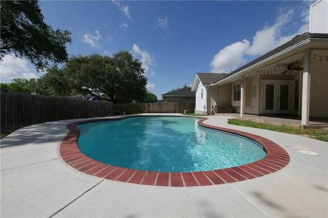 4010 Moorhead Dr, Corpus Christi, TX 78410 - view of pool featuring french doors, a fenced backyard, a patio, and a ceiling fan
