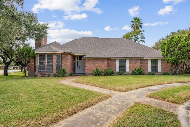 single story home with a front lawn