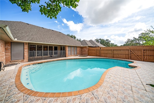 view of pool featuring a patio