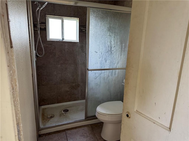 423 S 13th St, Kingsville, TX 78363 - full bathroom featuring tile patterned floors and a shower stall
