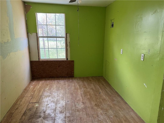 423 S 13th St, Kingsville, TX 78363 - unfurnished room featuring hardwood / wood-style floors and a ceiling fan