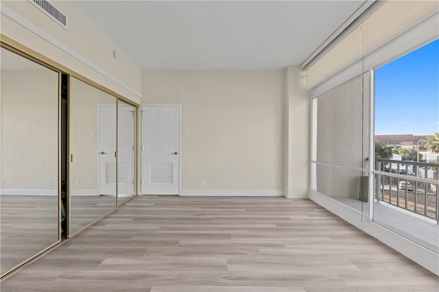 unfurnished sunroom with a wealth of natural light