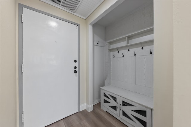 mudroom with light hardwood / wood-style flooring