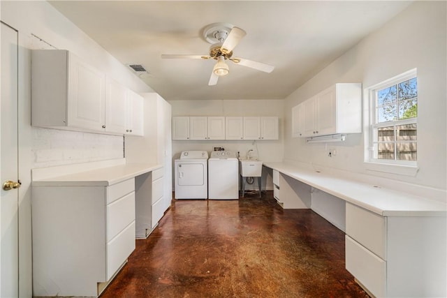 laundry area with visible vents, a ceiling fan, a sink, independent washer and dryer, and cabinet space