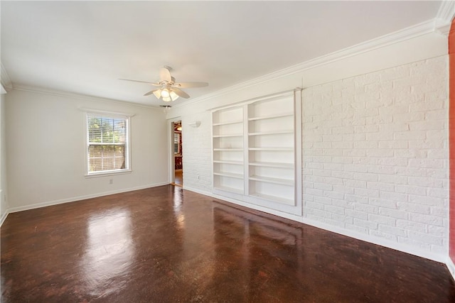 unfurnished room featuring baseboards, a ceiling fan, built in features, and ornamental molding