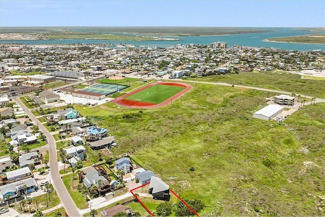 birds eye view of property with a water view