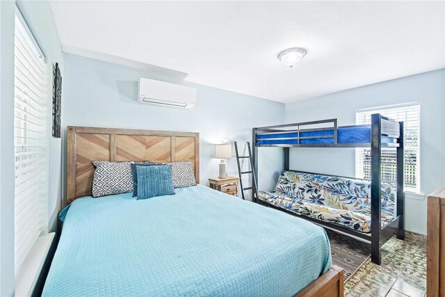134 N Alister St Unit 23, Port Aransas, TX 78373 - bedroom with a wall mounted AC