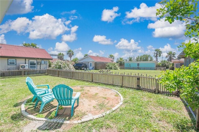 134 N Alister St Unit 23, Port Aransas, TX 78373 - view of yard with a fenced backyard