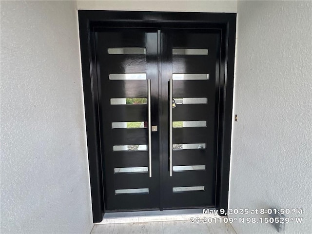 113 Gonzalez Dr, San Juan, TX 78589 - entrance to property with stucco siding and french doors