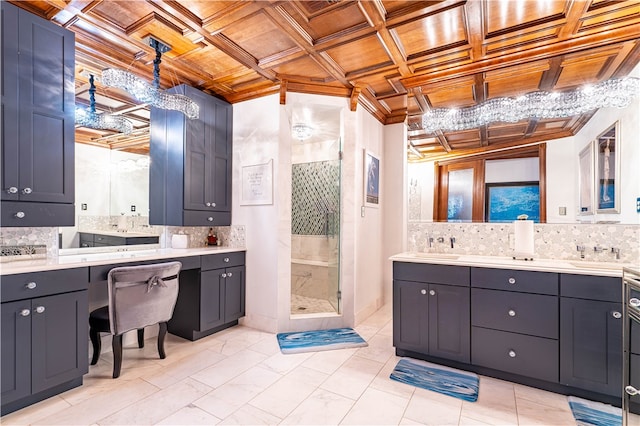 bathroom featuring a shower, sink, and tasteful backsplash