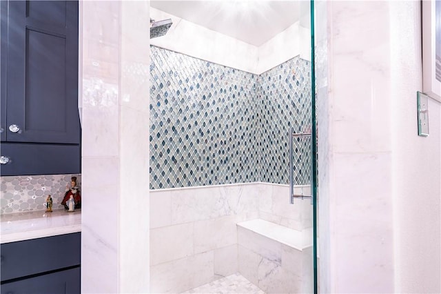 121 Glenmore St, Corpus Christi, TX 78412 - bathroom featuring a shower stall, tile walls, and vanity