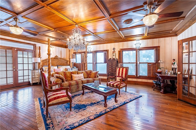 living room with wood walls, hardwood / wood-style flooring, wood ceiling, coffered ceiling, and french doors