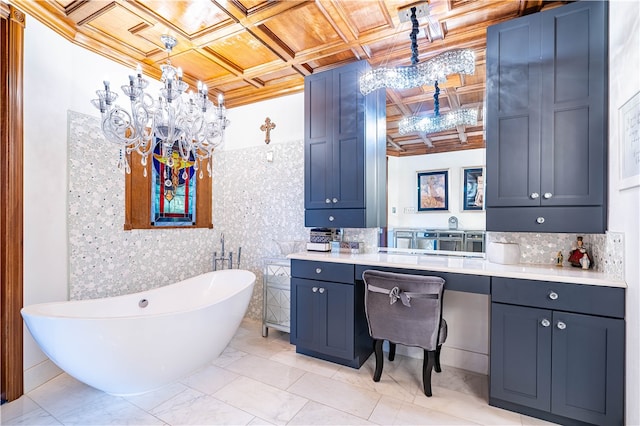 bathroom featuring backsplash, vanity, a tub, and coffered ceiling