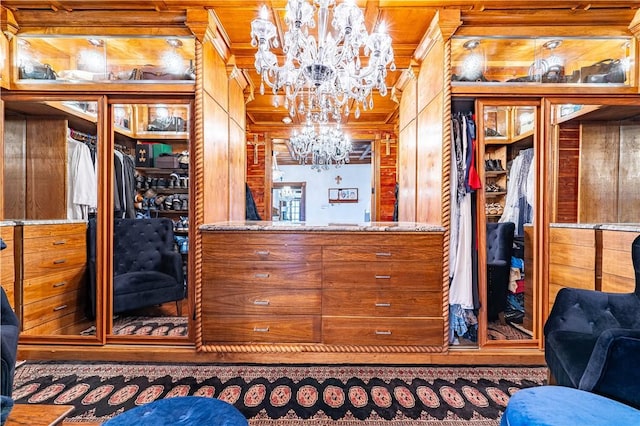 121 Glenmore St, Corpus Christi, TX 78412 - bar area featuring a chandelier, crown molding, and wood walls