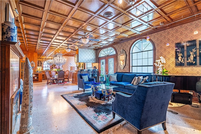 living room featuring coffered ceiling and ceiling fan