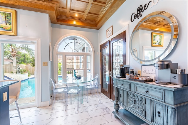 foyer featuring beamed ceiling, crown molding, coffered ceiling, and wooden ceiling