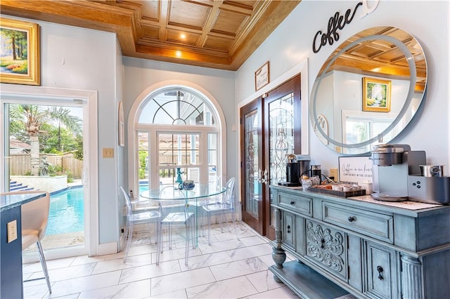 121 Glenmore St, Corpus Christi, TX 78412 - foyer with light marble finish floors, coffered ceiling, crown molding, wooden ceiling, and french doors