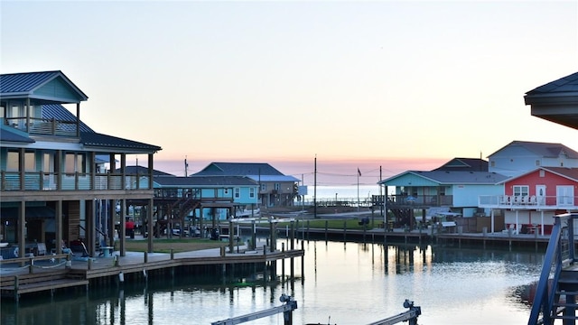 dock area with a water view