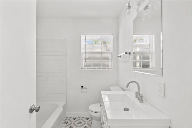 full bathroom featuring toilet, baseboards, and vanity