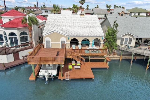 15230 Isla Pinta Ct, Corpus Christi, TX 78418 - dock area featuring a water view, boat lift, and a residential view