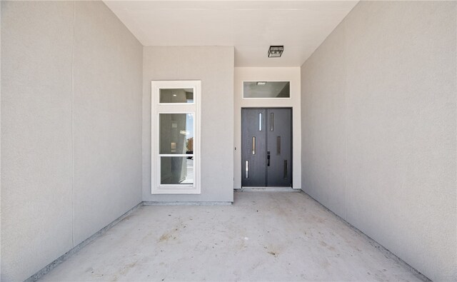 kitchen with a kitchen island and concrete floors