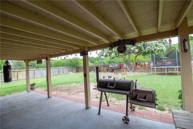 1512 Palo Blanco, Beeville, TX 78102 - view of patio / terrace featuring a grill, a trampoline, and a fenced backyard