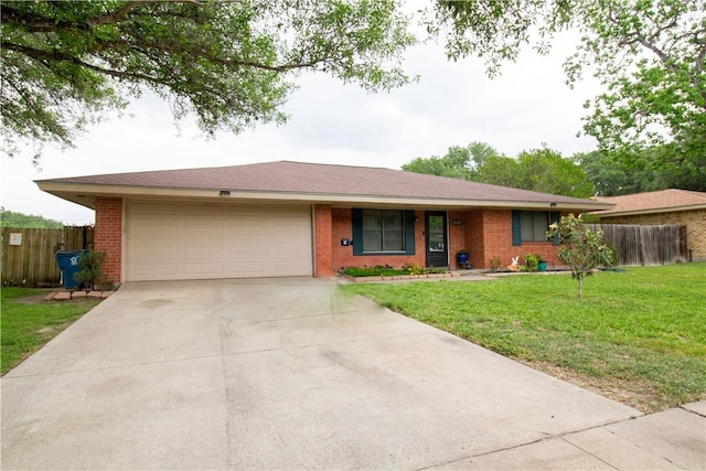 1512 Palo Blanco, Beeville, TX 78102 - single story home with fence and brick siding