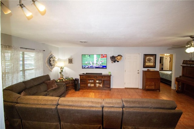1512 Palo Blanco, Beeville, TX 78102 - living room featuring a ceiling fan and tile patterned floors