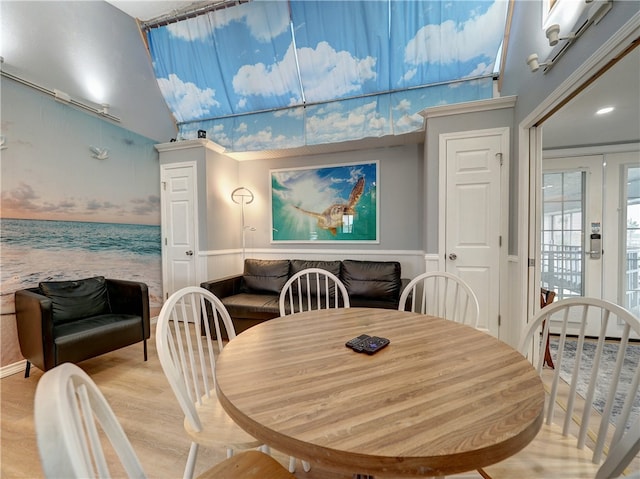 dining area with light hardwood / wood-style flooring