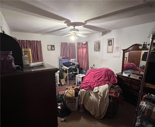 3751 Wilson Dr, Corpus Christi, TX 78408 - bedroom with carpet, a textured ceiling, and ceiling fan