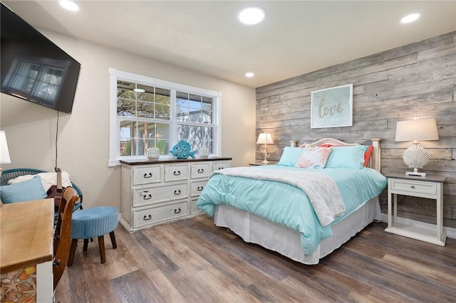 1214 Enterprise Blvd, Rockport, TX 78382 - bedroom with wood finished floors, wood walls, recessed lighting, and an accent wall
