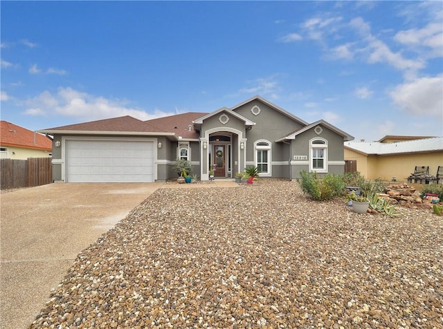 single story home featuring a garage