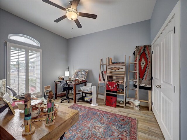 interior space with light hardwood / wood-style flooring and ceiling fan