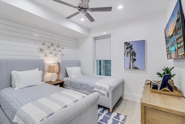 bedroom with recessed lighting, ceiling fan, baseboards, and wood finished floors