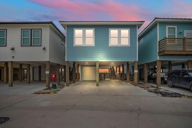 view of front of property with a carport