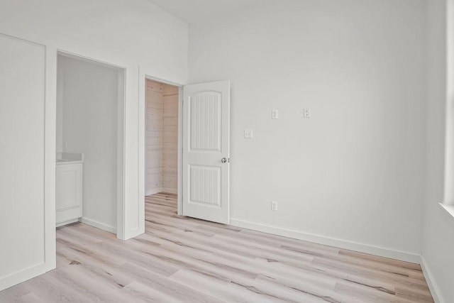 unfurnished bedroom featuring light hardwood / wood-style flooring